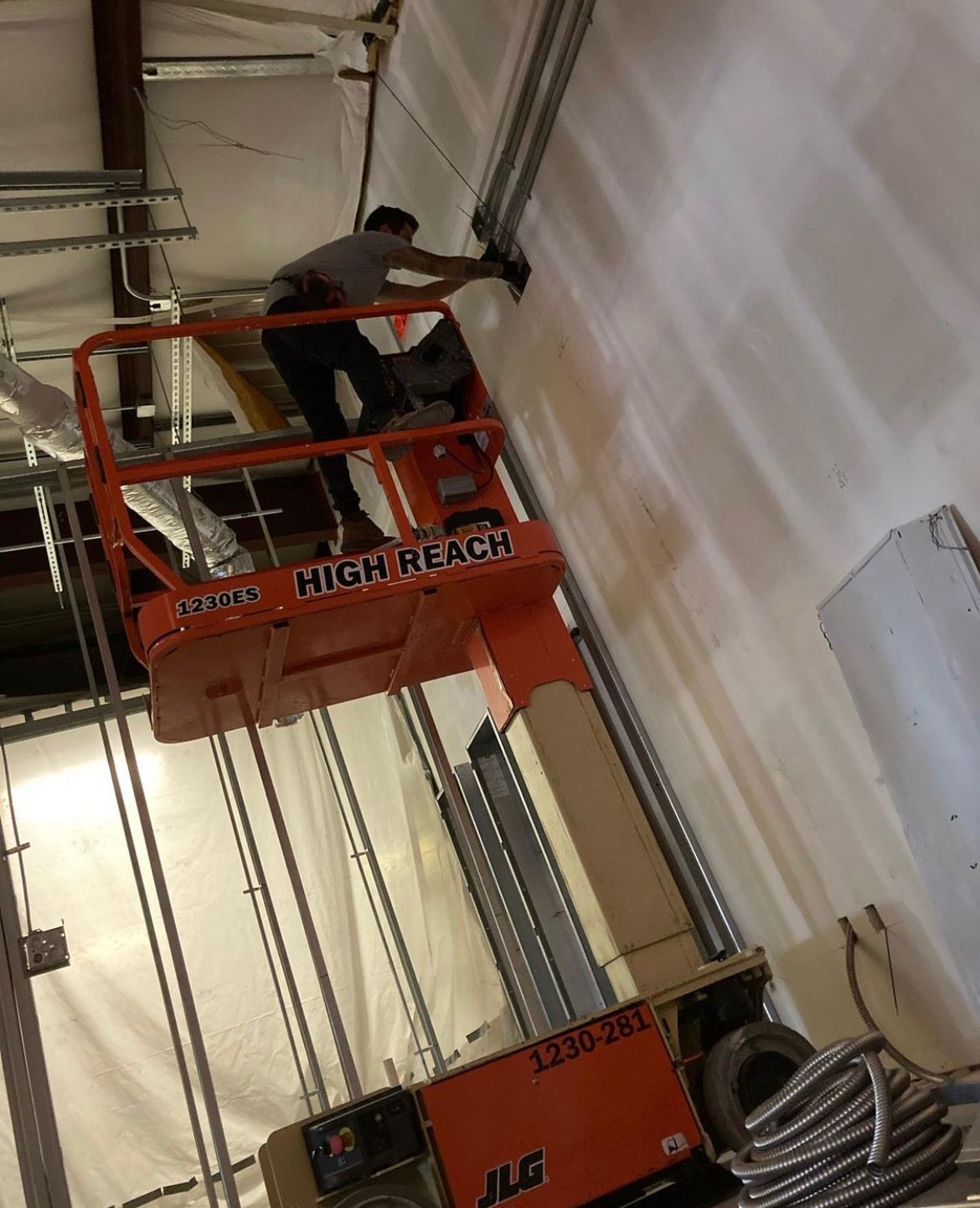 Electrician on lift